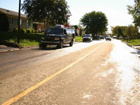 Grand format 800 X 600, lendemain d'inondation sur la rue Papillon, 27 septembre 2005. Photo: Patrick Larue